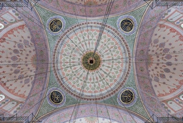 A picture of the colorful and gorgeous interior of the New Mosque, in Istanbul