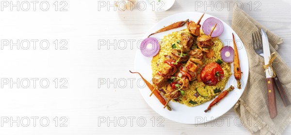 Kebabs with vegetables and bulgur