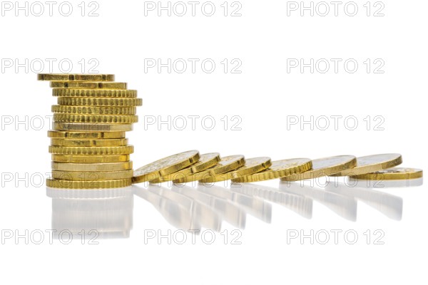 Stacks of coins and lying coins, symbolic photo for mountain of debt, profit collapse and deductions Austria