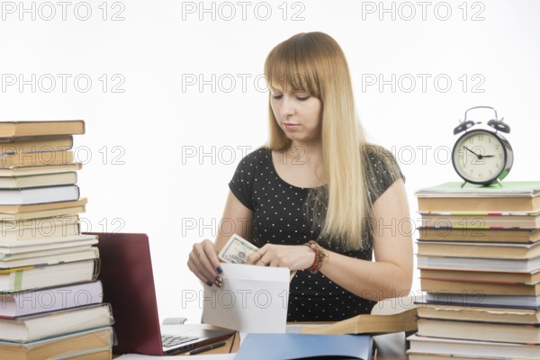 The teacher said the amount of bribe in an envelope