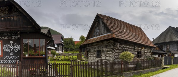 Cicimany, Slovakia, 27 September, 2022: historic timbered houses with white decorative paint in the folklore reserve of Cicimany in Slovakia, Europe