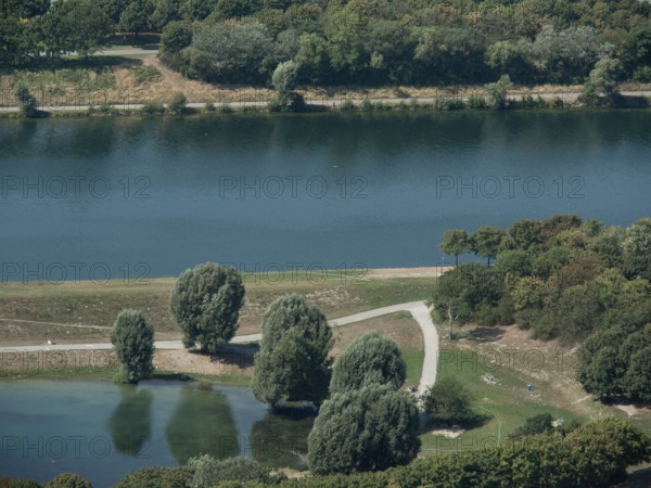 River with bank and trees, next to it a path along the shoreline, Vienna, Austria, Europe