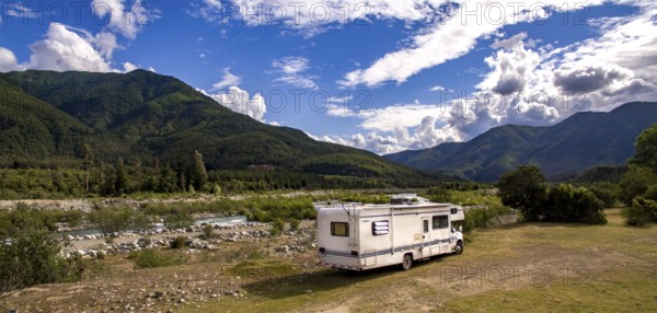 Food, Motorhome in Chilean Argentine mountain Andes. Family trip travel vacation on Motorhome RV in Andes
