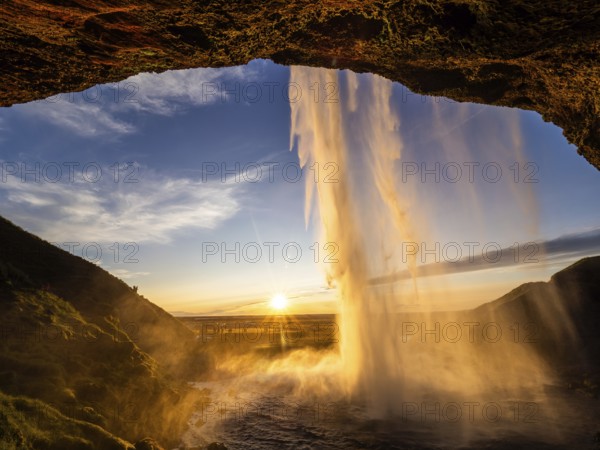 Sunset at Seljalandsfoss waterfall, South Iceland, Iceland, Europe