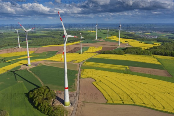 Wind power, wind energy plant, wind wheel, wind turbines, wind power plant, WEA, Kaiserslautern district, energy, electricity, rape fields, landscape, Rothselberg, Kaiserslautern district, Rhineland-Palatinate, Federal Republic of Germany