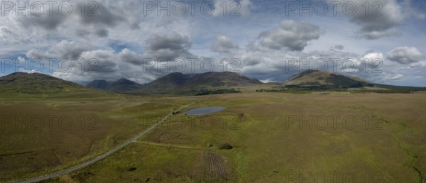 Drone panorama landscape of Connemara National Park and the Twelve Bens mountains in western Ireland