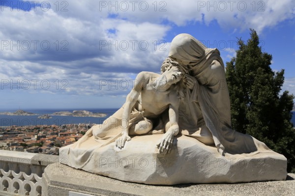 View from the Basilica Notre Dame de la Garde to the Archipelago du Frioul, Frioul Islands, Ile Ratonneau, Ile Pomegues, Ile d'If with prison Chateau d'If, Tiboulen, in front sculpture Pieta, Marseille, Departement Bouches du Rhone, Region Provence Alpes Cote d'Azur, France, Mediterranean Sea, Europe