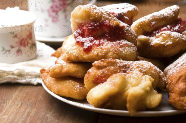Dough with marmelade on wooden board, lodz, poland