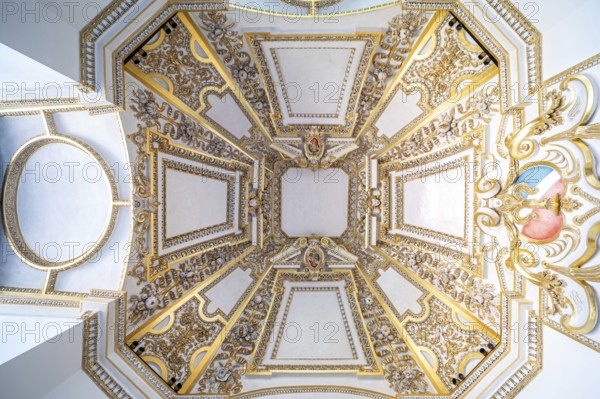 Krakow, Poland, March 23, 2024, Decorated white ceiling with gold plated ornaments, Europe