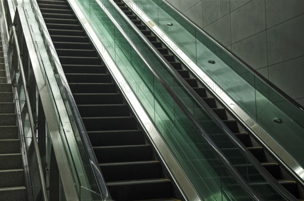 Detail of modern glass and metal escalator