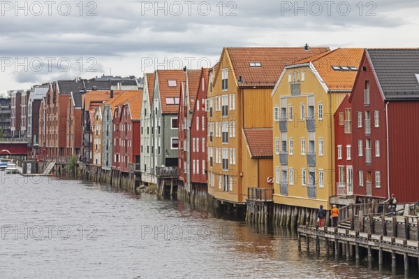 Colourful old timbered storehouses at the river Nidelva in Trondheim, Norway Colorful old timbered storehouses at the river Nidelva inTrondheim, Norway, Europe
