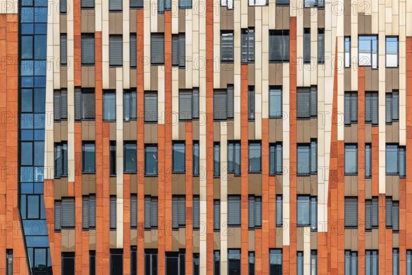 Hamburg, Germany, August 7, 2019: New Sumatrakontor building at Hamburg HafenCity, a mixed-use block by Dutch architect Erick van Egeraat. Shops, offices, luxury apartments and five star hotel, Europe