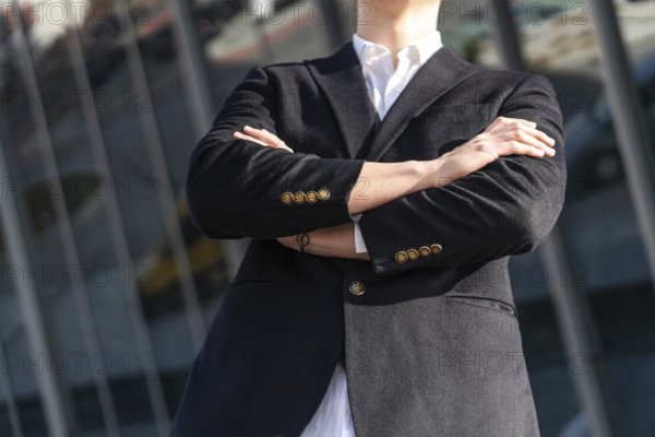 Photo of business man in classic black suit, shirt holding hands folded Achievement career wealth business concept. copy space