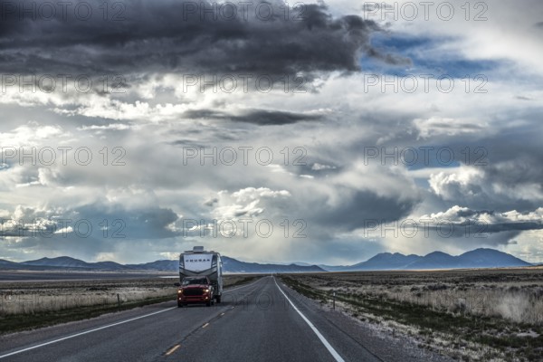 Wild thunderstorm and rain clouds over the Great Basin Highway US 93, between Ely and Baker, Nevada, USA, North America