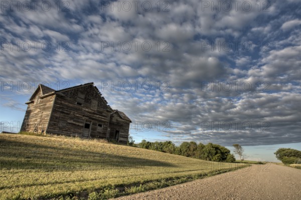 Abandoned Farmhouse Saskatchewan Canada sunset and prairie view
