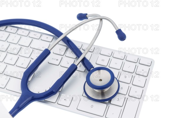 Stethoscope and keyboard of a computer, symbolic photo for diagnostics and appointment management Austria