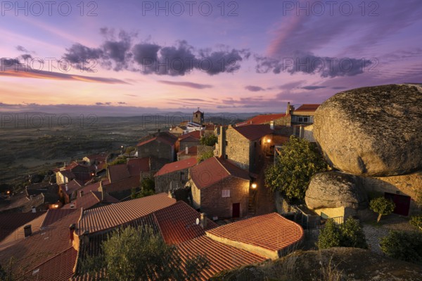 Monsanto historic village with stone boulder buildings and landscape at sunset, in Portugal