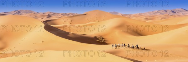 Merzouga in the Sahara Desert in Morocco. Afica. Web banner in panoramic view
