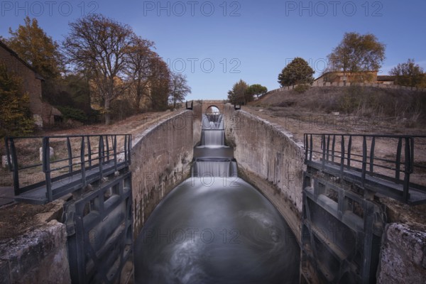 Waterfall in Touristic attraction Canal de Castilla, famous landmark in Palencia, Spain, Europe
