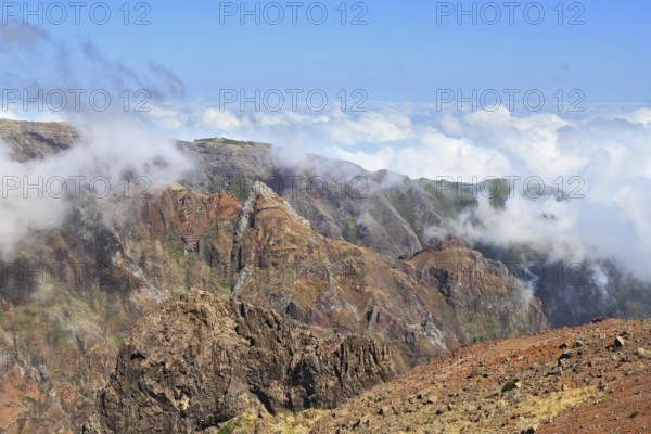 The highest peak of Madeira Island - Pico Ruyvu. By strong wind in the mountains of Madeira flying clouds