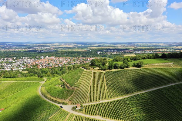 Aerial view of the Scheuerberg near Neckarsulm with its striking summit cross. Neckarsulm, Heilbronn, Baden-Württemberg, Germany, Europe