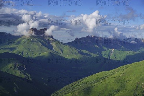 Beautiful summer landscape with clouds in Caucasus Mountains, Russia, Europe