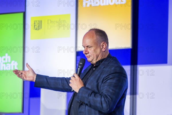 The Dresden factory is Jenoptik's most modern production facility. The optical systems manufactured there are what make the global chip industry possible in the first place. At almost 100 million euros, the largest single investment in the company's recent history was realised for this purpose. Mayor of the City of Dresden, Dirk Hilbert gives a welcoming speech, Dresden, Saxony, Germany, Europe