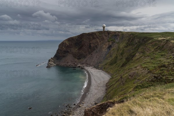 View of the cliffs at Hartland Point in Devon with the United Kindom RAF radar station perched on the clifftop