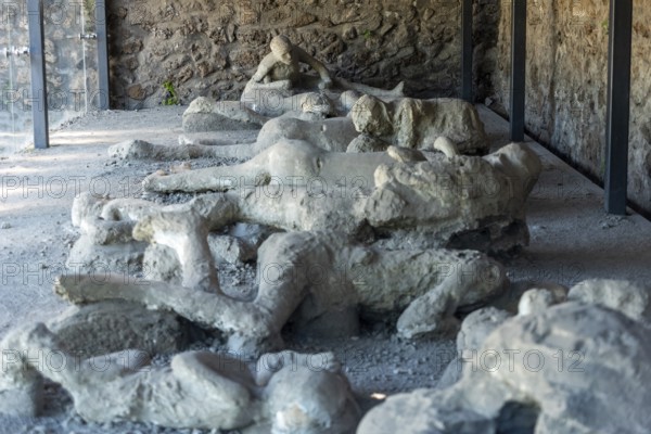 POMPEII, ITALY, MAY 04, 2022, Pompeiian inhabitants petrified in their last situation of life, Southern Italy