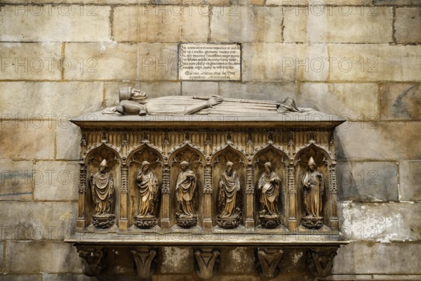 Stone headstone in the Duomo. Milan, Italy.