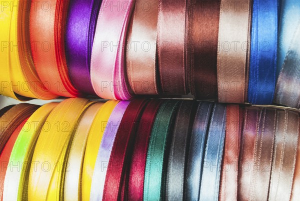 The many-coloured ribbon spools in the craft