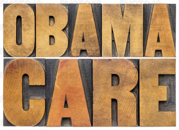 Obamacare typography - isolated word abstract in letterpress wood type