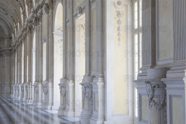 Venaria Reale, Italy, 16 July 2023: luxury gallery perspective, decorative marble, indoor, nobody, Royal Palace. Italy travel destination, Europe