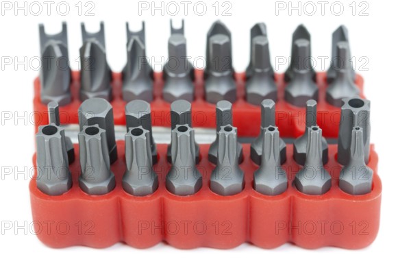 Set of heads for screwdriver in red box isolated on white background
