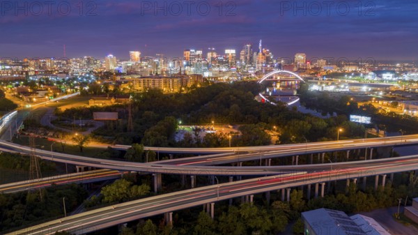 Pink light befroe morning dawn sun reflects on clouds over downtown Nashville TN