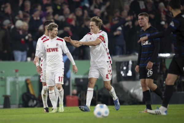 BEAUTIFUL SPORTS/ (DFL/DFB REGULATIONS PROHIBIT ANY USE OF PHOTOGRAPHS AS IMAGE SEQUENCES AND/OR QUASI-VIDEO) Cologne, RheinEnergieStadion, North Rhine-Westphalia, Florian Kainz (1.FC Köln, midfield, #11), Timo Hübers (1.FC Köln, defence, #4), DFB-Pokal 1.FC Köln, Hertha BSC on 04.12.2024 at RheinEnergieStadion in Cologne Germany