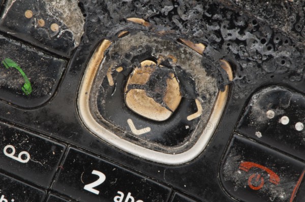 Burned GSM. Display and buttons close up