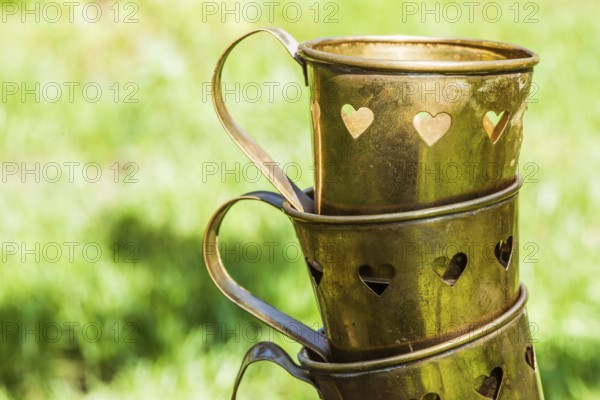 Metal cups with heart shapes