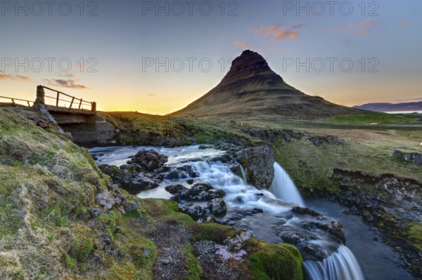 Kirkjufell with Kirkjufellsfoss in Iceland at sunset