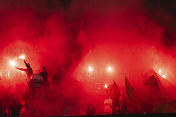 LUBIN, POLAND - DECEMBER 8, 2024: Football match Polish PKO Ekstraklasa between KGHM Zaglebie Lubin vs Legia Warszawa 0:3. Supporters of Zaglebie burns flares.