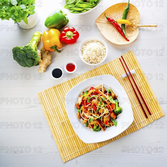 Sweet and sour chicken with rice and vegetables