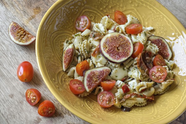 Italian pasta salad with figs and mini roma tomatoes