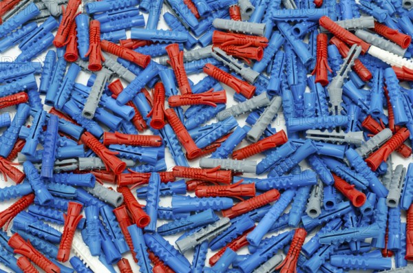 A lot of new multicoloured plastic dowels