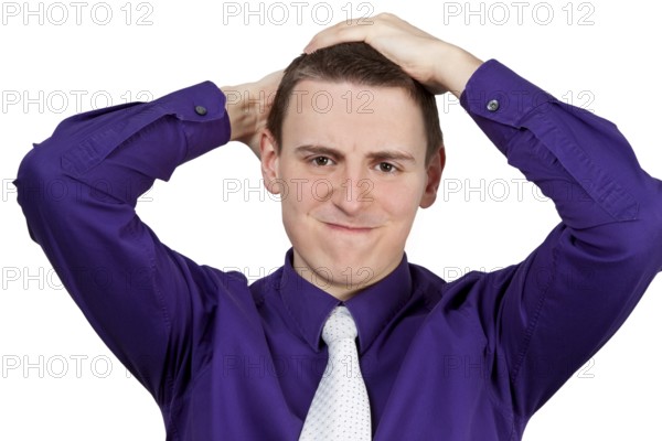 Young man with shirt and tie ruffling his hair - optional