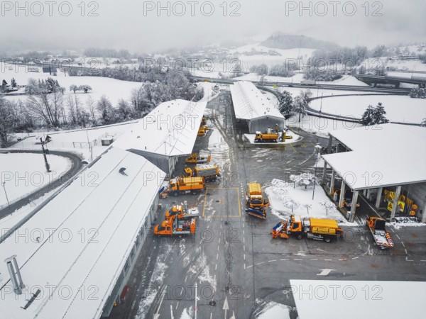 Highway maintenance job base in the middle of winter on a snowy day. Snow causing problems and delays on the highway