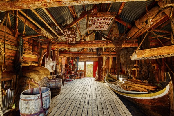 A wooden interior features tightly packed fishing equipment and a small boat, suggesting a seashore setting, mountains, rocks, road, sea, ocean, water, nature, couds, vilage, Lofoten Islands, Norway, Norge, Europe