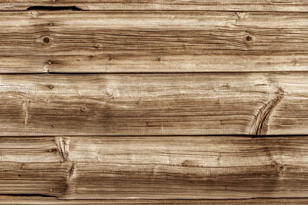 A wooden wall built from old boards. Concept photo for Hintergünde Austria
