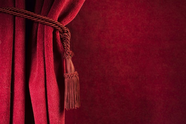 Red theatre curtain and red tassels