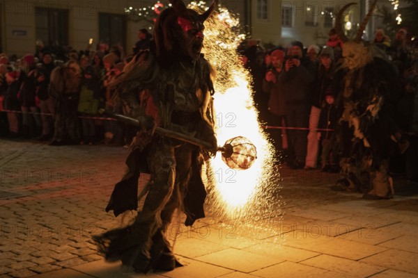 Labertaler Höllenteufel Perchte with burning fireball looking right