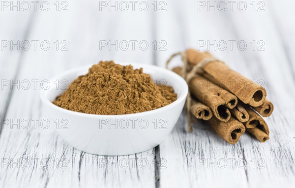 Portion of fresh made Cinnamon (close-up shot, selective focus)